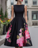 FJØRNA black floral printed sleeveless midi dress for women, shown with a fitted waist and flowy skirt.