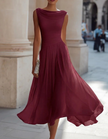 FJØRNA chiffon midi dress for women with draped neckline and pleated skirt, elegant and flowy fabric in a stylish design