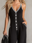 FJØRNA black color-block V-neck sleeveless jumpsuit with button-down front and wide-leg pants for women.