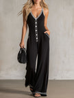 FJØRNA women's black colour-block V-neck sleeveless button-down jumpsuit with tailored pants, stylish and modern design.