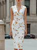 White floral deep V-neck bodycon midi dress by FJØRNA, showing the fitted design, floral pattern, and elegant V-neck neckline.