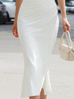 FJØRNA cold-shoulder draped high-neck midi cocktail dress with elegant design and flowing fabric, perfect for special occasions.