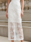 FJØRNA spaghetti strap lace overlay bodycon midi dress with fitted silhouette and elegant design, perfect for cocktail occasions.