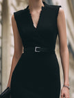 FJØRNA sleeveless wrap V-neck belt mini dress, elegant cocktail dress with fitted waist and stylish design, shown on model.