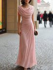FJØRNA black draped cowl-neck ruched maxi dress displayed on a model, showcasing elegant evening wear with flowing fabric and sophisticated design.