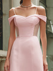 Elegant pink off-the-shoulder maxi dress by FJØRNA, flowing fabric and feminine design, displayed on a hanger.