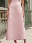 Pink off-the-shoulder maxi dress by FJØRNA with flowing fabric and elegant design, perfect for formal or summer occasions.