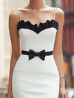 FJØRNA scalloped trim bow-waist midi cocktail dress with fitted silhouette and elegant design, featuring a flattering waist bow detail.