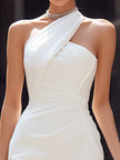 White FJØRNA asymmetric draped halter-neck midi dress, elegant cocktail dress with a flowing silhouette and stylish design.
