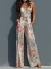 White floral satin halter neck jumpsuit with wrap front and wide-leg pants for women by FJØRNA.