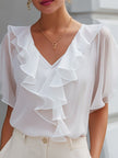 White V-neck sheer sleeve ruffle blouse for women by FJØRNA, featuring a feminine design with flowy sleeves and elegant ruffle details.