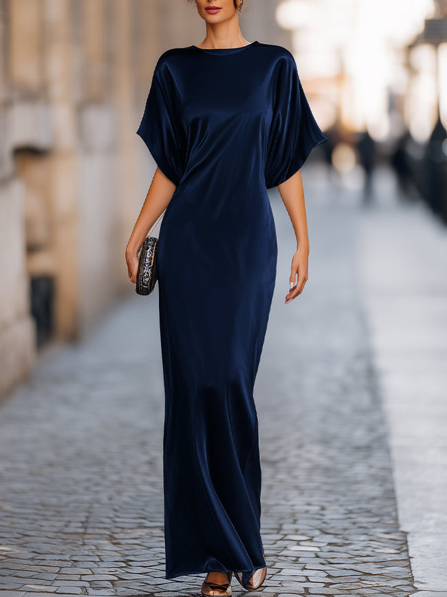 FJØRNA Batwing Sleeve Fluid Column Maxi Dress in elegant evening style, featuring flowing fabric and a sleek silhouette.