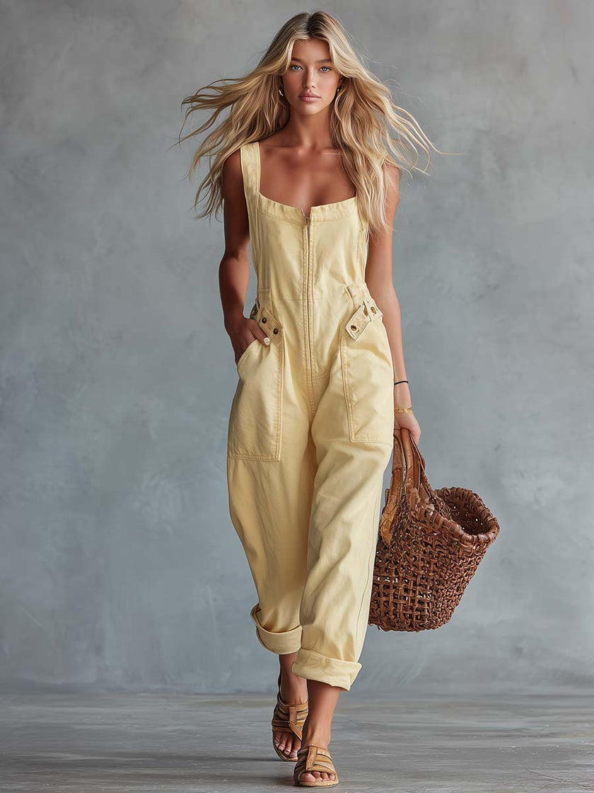 Light yellow denim square neck zip-front jumpsuit for women by FJØRNA, featuring a stylish fit and casual design.
