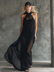 Black mesh hooded maxi dress for women by FJØRNA, featuring a flowy design with a hood and sheer mesh fabric.