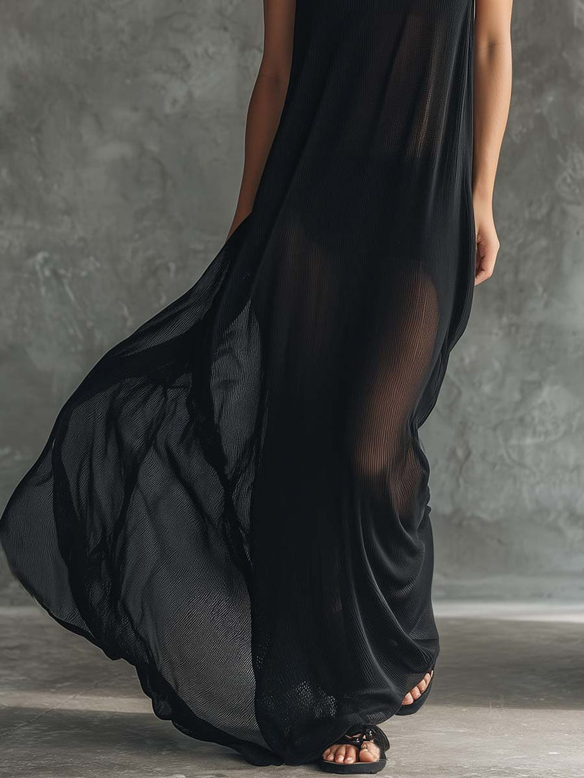 Black mesh hooded maxi dress for women by FJØRNA, featuring a flowing silhouette and sheer fabric with a hood.