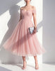 Pink tulle midi dress for women by FJØRNA, featuring a flowy, elegant design with delicate fabric and a flattering fit.