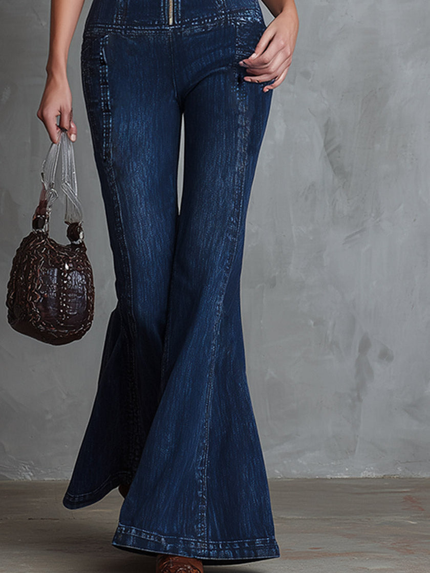 Dark blue denim flared jumpsuit for women by FJØRNA, featuring a fitted bodice and flared pant legs, casual and stylish.