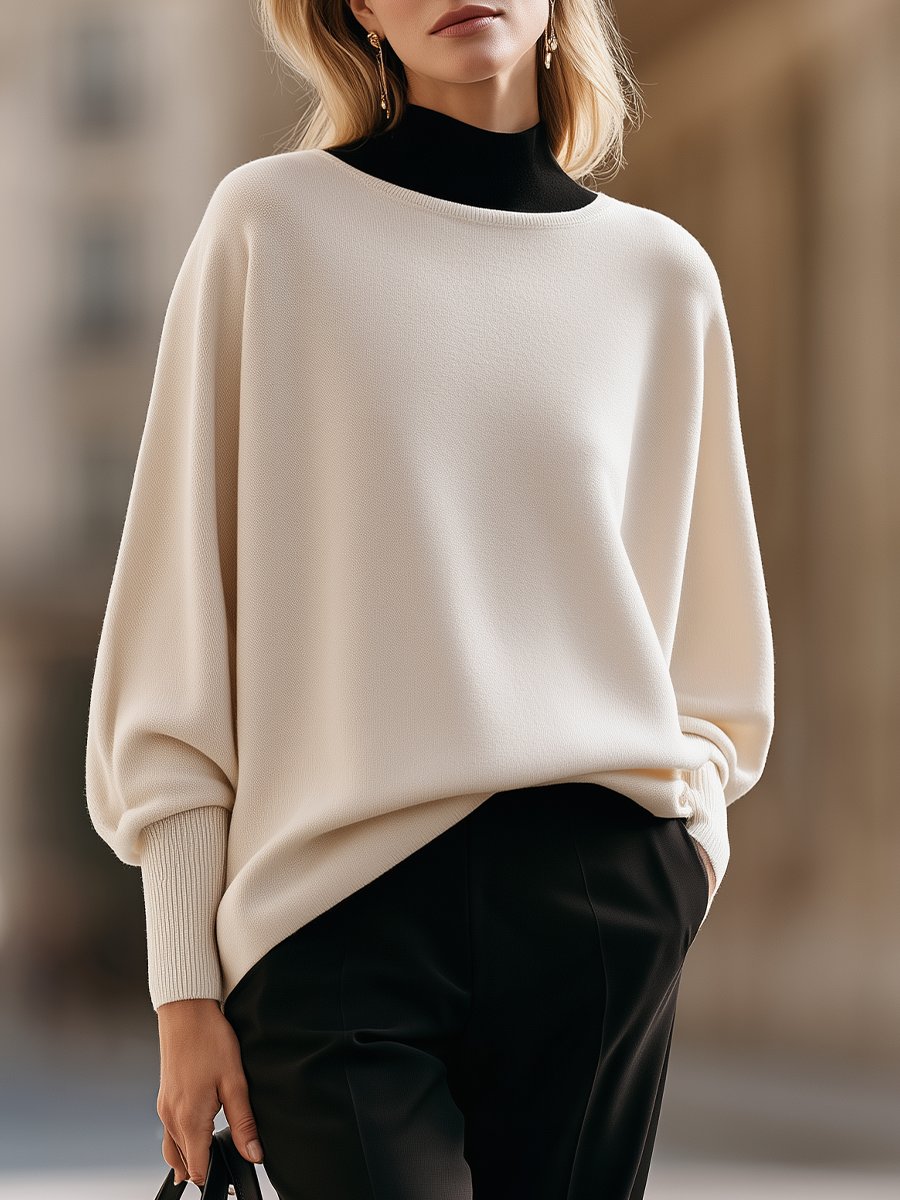 Batwing Sleeve Round Neck Sweater with Ribbed Cuffs and Longline Fit for Women