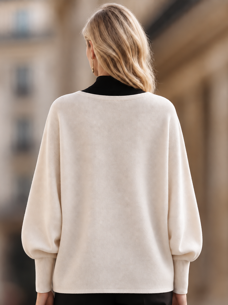 Batwing Sleeve Round Neck Sweater with Ribbed Cuffs and Longline Fit for Women