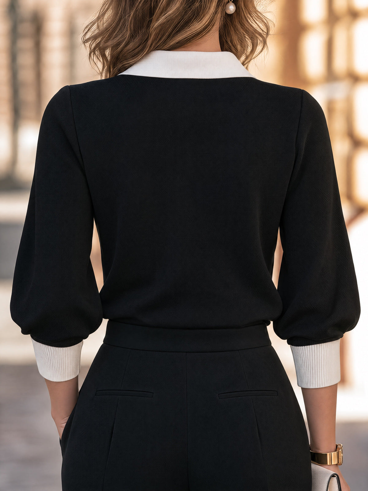 Black V-Neck Knit Top with White Collar and Three-Quarter Sleeve Cuffs for Women