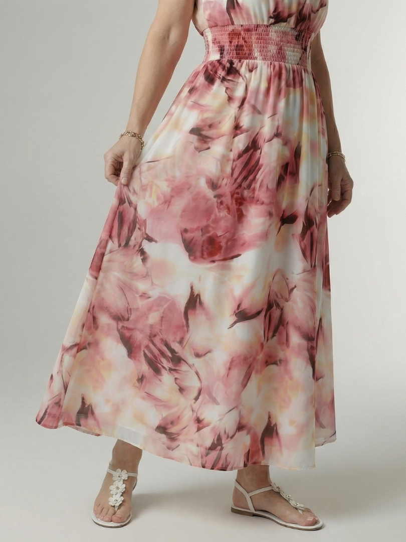 FJØRNA women's summer midi dress with halter neck and sleeveless, flowy fabric, perfect for warm weather and casual outings.