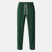 Men's wide-leg drawstring joggers by FJØRNA, relaxed casual sweatpants in soft fabric, shown in a neutral color with elastic waistband.