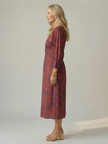 Flowy summer midi dress for women by FJØRNA featuring long sleeves and a wrap design, perfect for warm weather wear