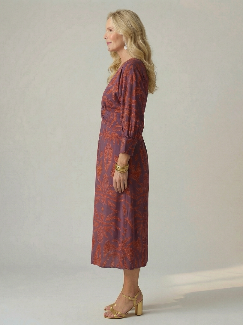 Flowy summer midi dress for women by FJØRNA featuring long sleeves and a wrap design, perfect for warm weather wear