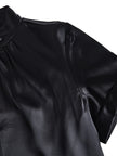White satin high-neck keyhole blouse for women by FJØRNA featuring a sleek, elegant design with a high neckline and keyhole detail.