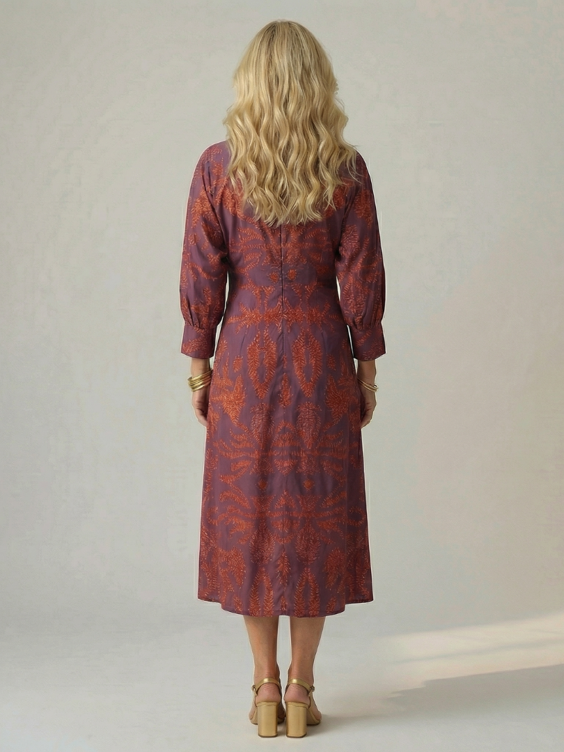 FJØRNA women's summer midi dress with long sleeves, wrap style, flowy fabric, perfect for warm weather occasions.