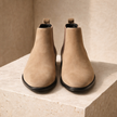 FJØRNA black slip-on Chelsea boots for men with sleek leather design and elastic side panels, stylish and comfortable footwear.