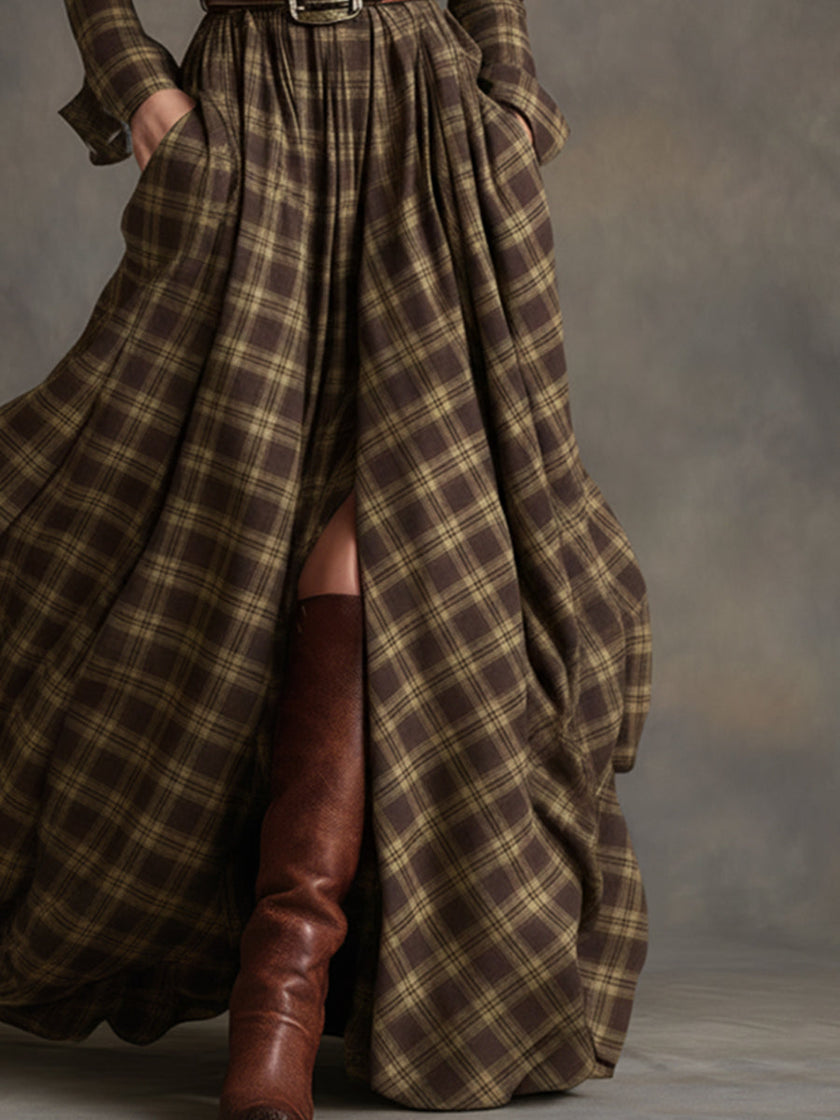 FJØRNA brown maxi dress, casual style, flowing fabric, sleeveless design, full-length dress on a hanger.