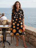 FJØRNA women's summer polka dot wrap dress, lightweight and stylish with a flattering fit, perfect for warm weather.