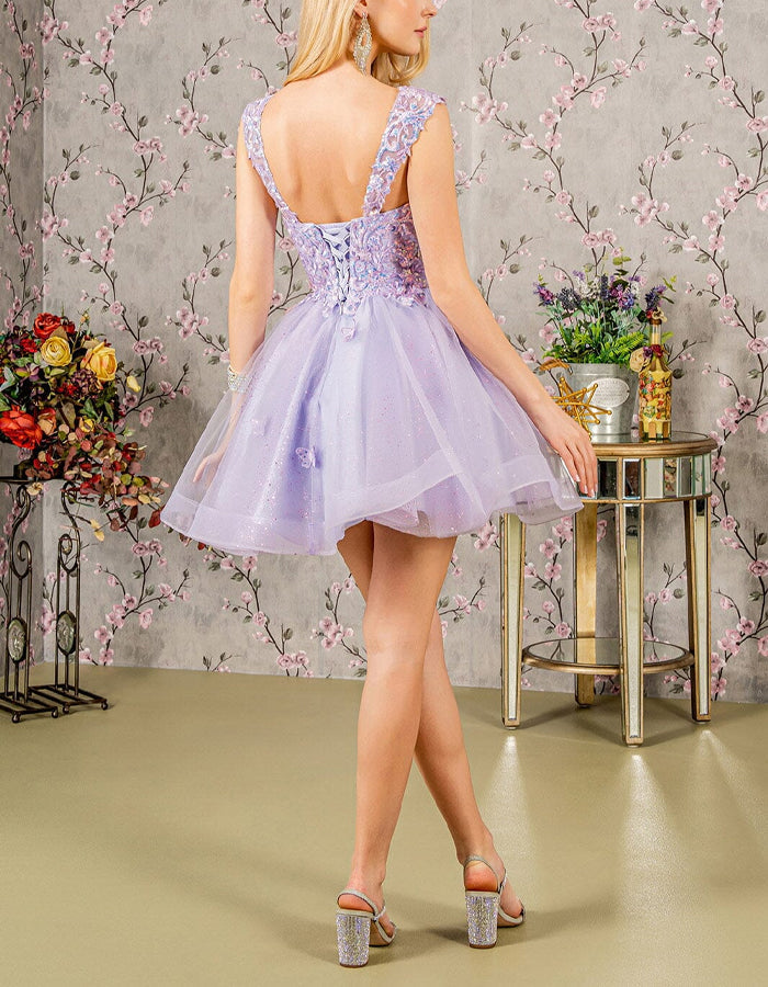 Mint green tulle cocktail dress for women by FJØRNA, sleeveless with a flowing, elegant design perfect for special occasions.