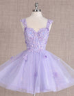 Mint green FJØRNA sleeveless tulle cocktail dress for women, featuring a flowy, elegant design perfect for special occasions.