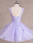 Mint green FJØRNA sleeveless tulle cocktail dress for women, elegant and flowing with a fitted bodice.