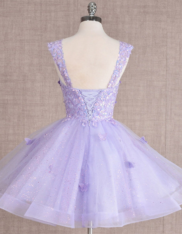 Mint green FJØRNA sleeveless tulle cocktail dress for women, elegant and flowing with a fitted bodice.