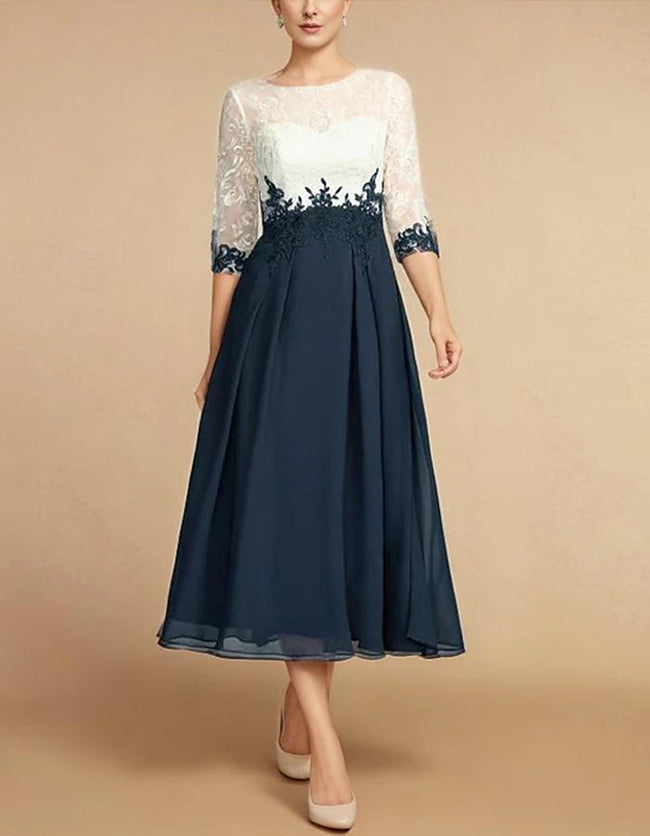 White chiffon midi dress for women with round neck by FJØRNA, featuring flowing fabric and elegant design.