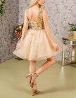 Mint green FJØRNA sleeveless tulle cocktail dress for women, showcasing a flowy, elegant design perfect for occasions.
