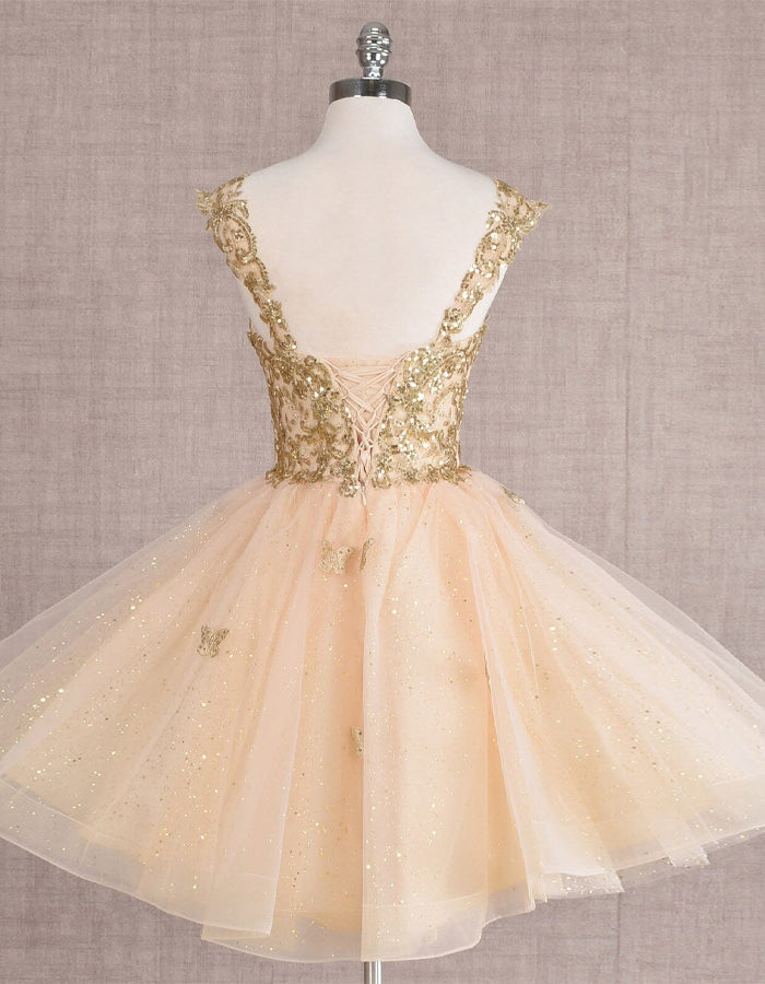 Mint green FJØRNA sleeveless tulle cocktail dress for women, elegant and flowing with a fitted bodice and full skirt.