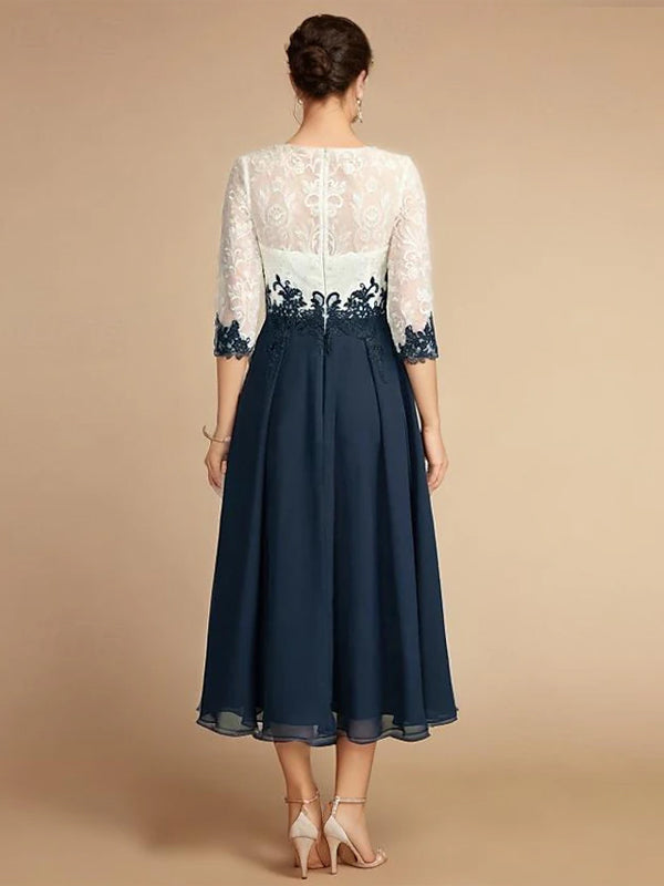 FJØRNA white chiffon midi dress for women with a round neckline, elegant flowy fabric, perfect for formal or casual occasions