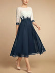 White chiffon midi dress for women with a round neck, stylish and elegant, by FJØRNA.