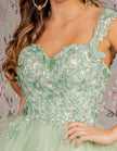 Mint green FJØRNA sleeveless tulle cocktail dress for women, elegant and flowy with a fitted bodice and delicate fabric details.