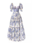 FJØRNA elegant off-shoulder printed organza evening gown, women's maxi dress with flowing fabric and floral pattern.