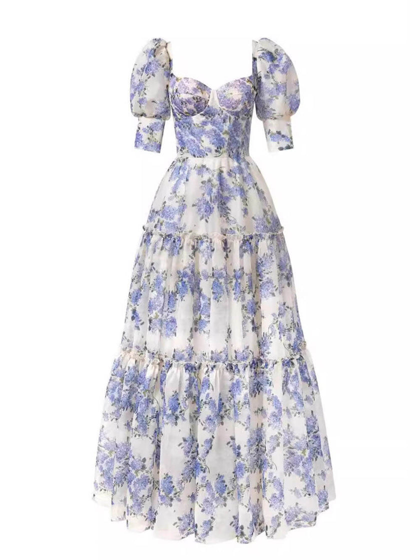 FJØRNA elegant off-shoulder printed organza evening gown, women's maxi dress with flowing fabric and floral pattern.
