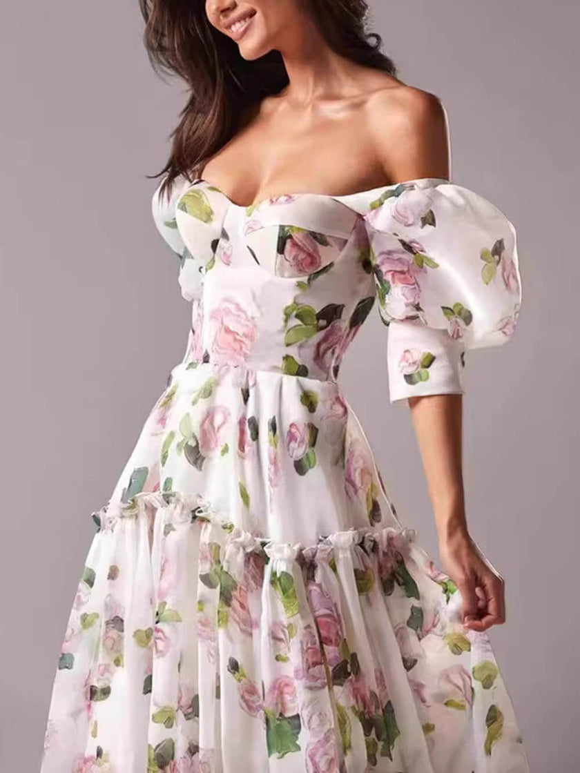 FJØRNA elegant off-shoulder printed organza evening gown, women's maxi dress with floral design and flowing silhouette.