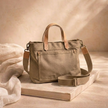 Large FJØRNA canvas messenger bag for women, stylish everyday shoulder bag with adjustable strap and spacious interior.