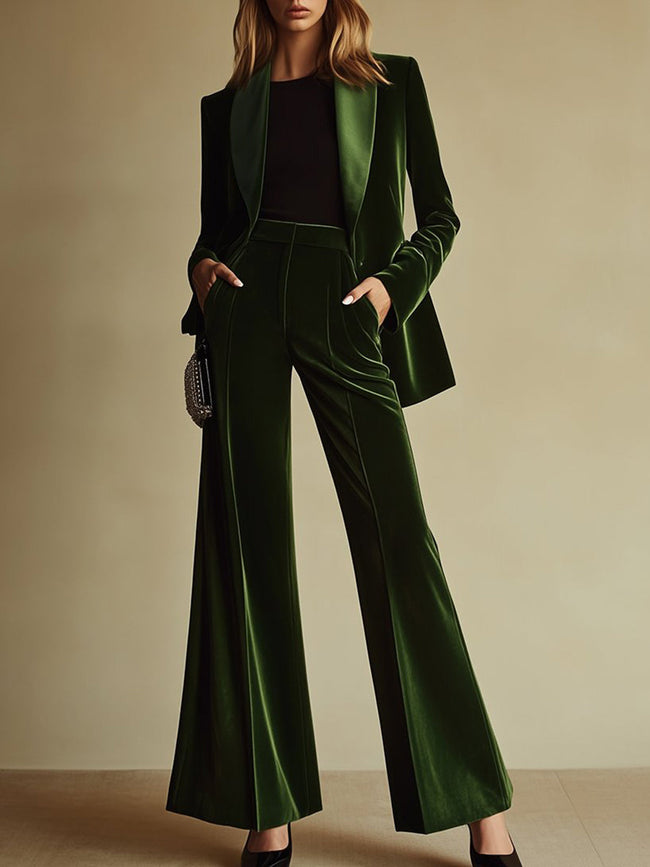 Emerald green velvet two-piece suit set for women, featuring loose pants and stylish top by FJØRNA.