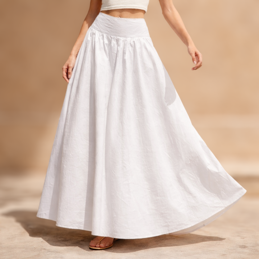 White cotton high-waist maxi skirt for women by FJØRNA, flowing and elegant with a full-length design.