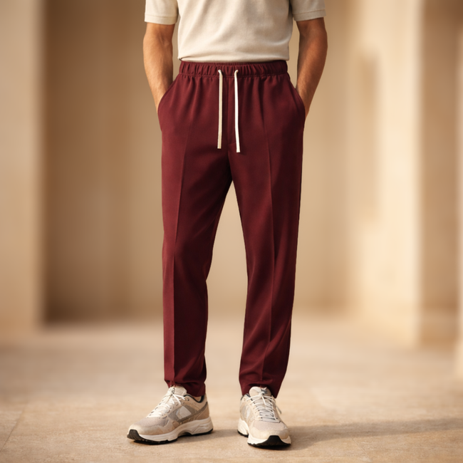 Men's wide-leg drawstring joggers from FJØRNA, relaxed casual sweatpants with a comfortable fit and adjustable waistband.